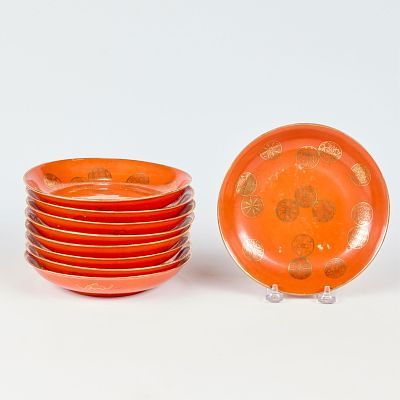 9 Chinese Porcelain Gilt Plates. Set of nine Chinese porcelain plates executed in red glaze with 