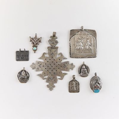8 Asian, Southeast Asian, & Ethiopian Pendants. Including one pendant depicting the Ethiopian 