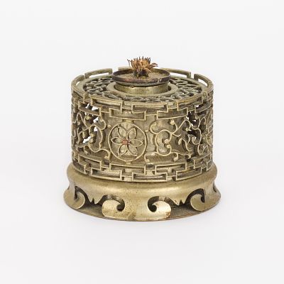 Small Tibetan Pierced Metal Lamp. Small pierced metal lamp, possibly bronze. Likely from 
