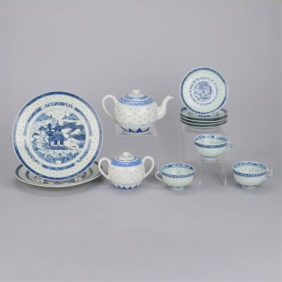 12 Pc Rice Pattern Chinese Porcelain. Including one teapot, one sugar bowl, three teacups, five 