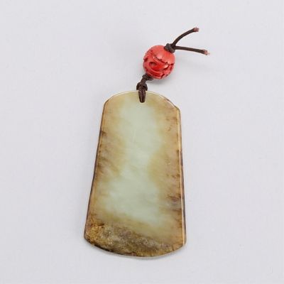 Chinese Carved Jade Ax Head. Chinese carved jade axe head. With a cinnabar wood bead. Lovely 