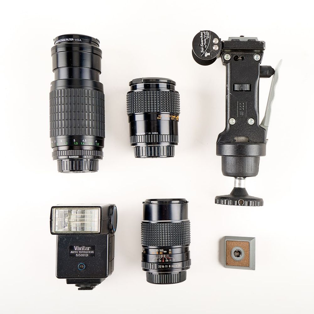 Lot 247: 6 Pcs Camera Equipment Incl. Lenses, Mount, & Flash