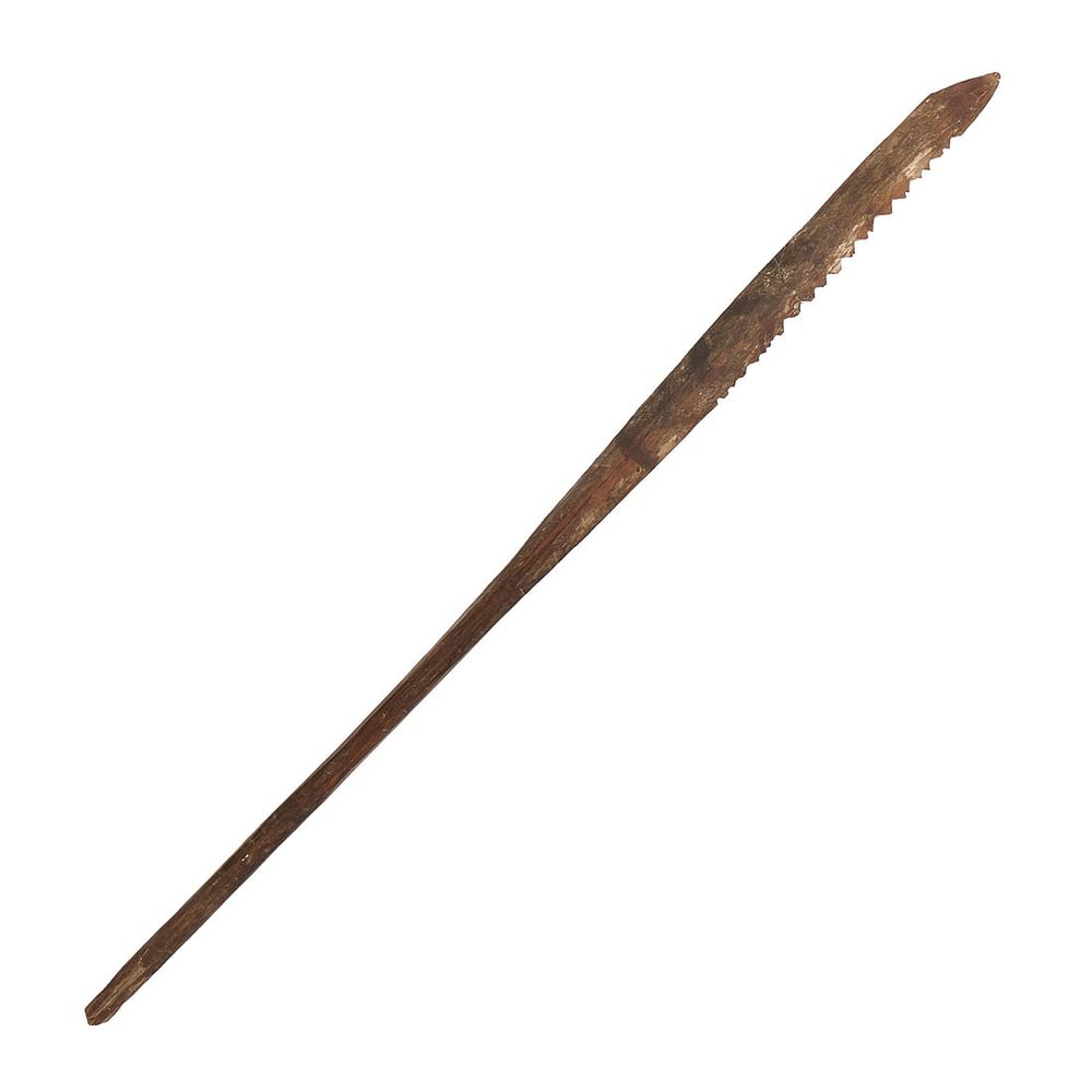 Lot 330: PNG Massim Carved Wood Serrated War Club