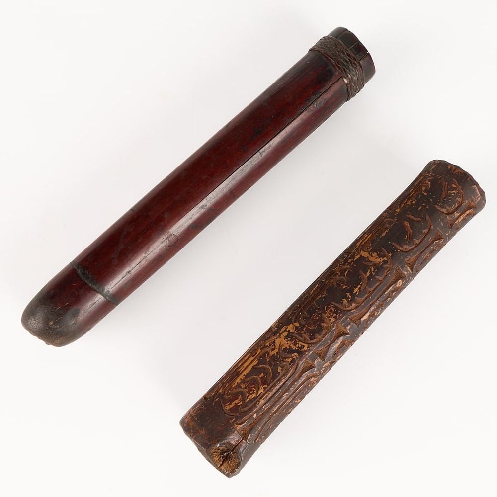 Lot 334: 2 PNG Asmat Carved Wood & Bamboo "Fu" Trumpets