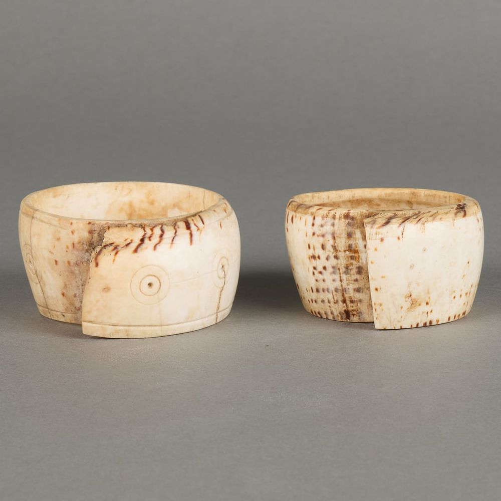 Lot 339: 2 PNG Carved Shell Armband Cuffs