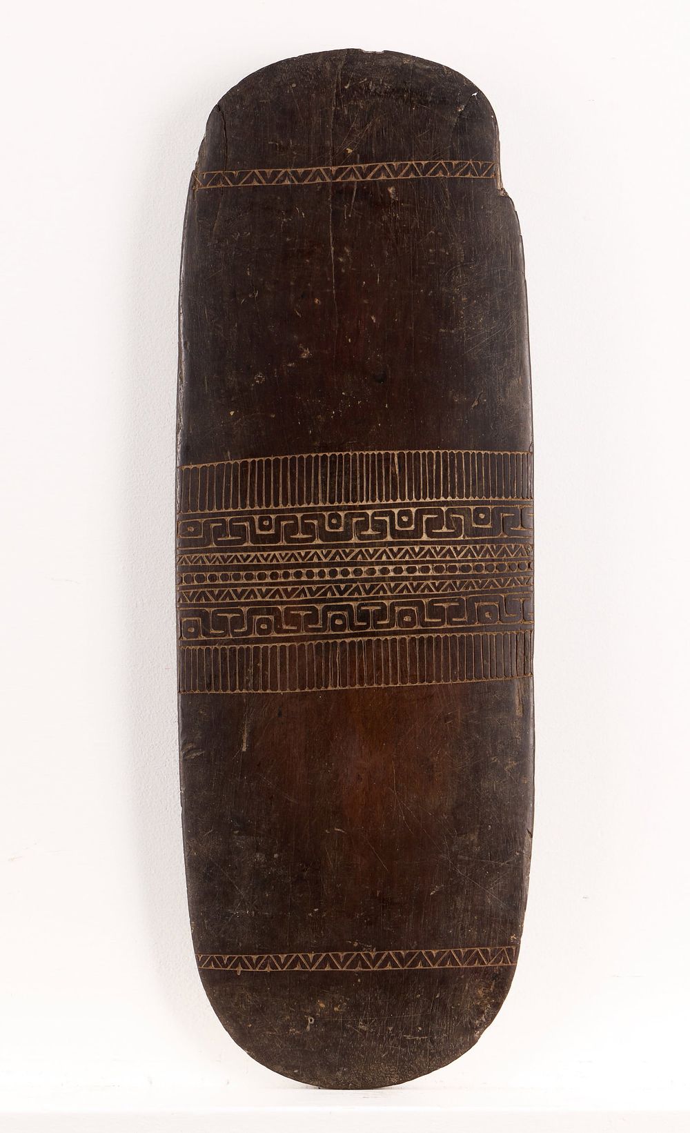 Lot 344: PNG Massim Carved Ironwood Skirt Board