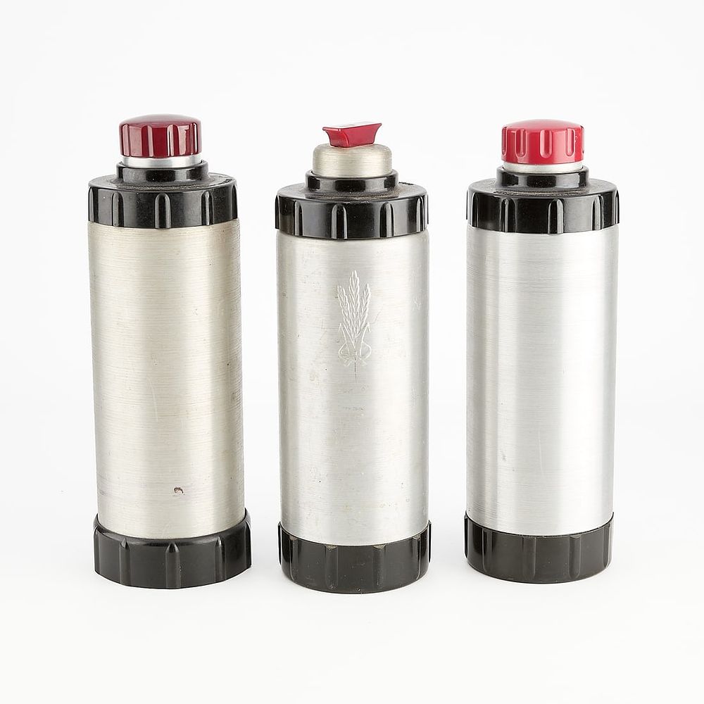 Lot 768: 3 West Bend Aluminum & Bakelite Cocktail Shakers