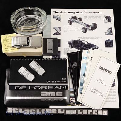 DeLorean Brochure, Manual, Badges, Lighter, More. Original 1981 DeLorean folder with owner's 