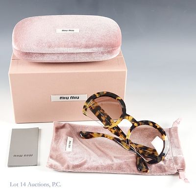Miu Miu Rasoir Sunglasses (SMU07Q). Miu Miu Rasoir half-rim sunglasses (SMU07Q 52 25 7S0-1L0 140 