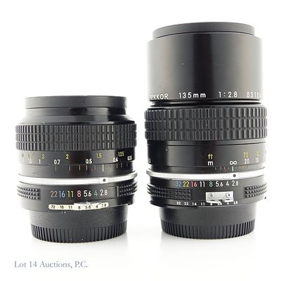 Nikon Nikkor 24mm f/2.8 and 135mm f/2.8 Lenses. Nikon Nikkor 24mm f/2.8 lens. Rear lens cap and 
