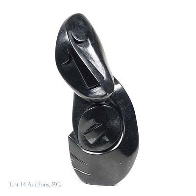 Zachariah Njobo Large Shona Sculpture. Large Shona sculpture carved from a black stone with dark 