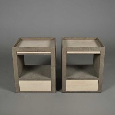 SIDE CABINETS, A PAIR in a suedette finish, each with a brushing slide each 62 cm H x 51 cm W x 