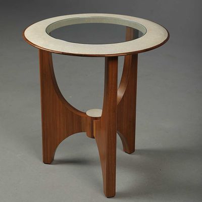 ZEUS OCCASIONAL TABLE BY LA GALUCHE circular, walnut with an inset glass top and shagreen style 