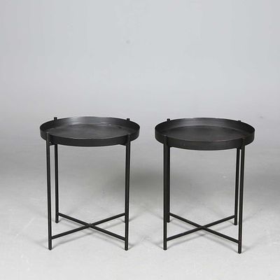 TRAY TOPPED TABLES, A PAIR The circular metal trays on bases, each 62cm H x 52cm W (2) OK