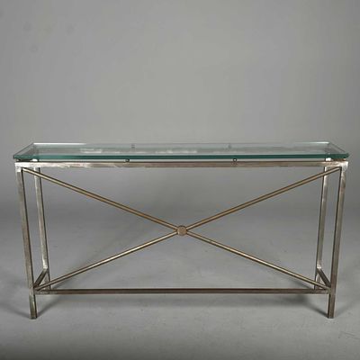 CONSOLE TABLE The damaged/chipped glass top on a metal base with X shaped detail, 90cm h x 160 