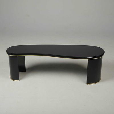 LOW UNIT Kidney shaped in black gloss with gold coloured detail 42 cm h x 128 cm w x 42 cm d Good