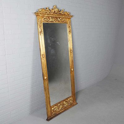 PIER GLASS. 19th century style, with a gilt frame with figural detail and mythical creatures 