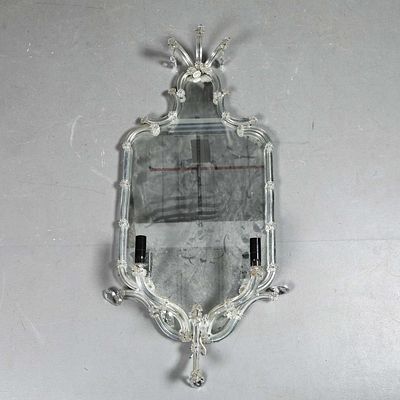 WALL MIRROR/GIRANDOLE With a shaped outline and two electrified branches 93cm H x 42 cm W. Untested.