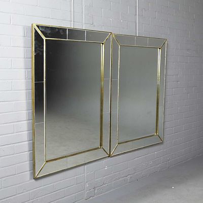 PAIR OF CUSHION WALL MIRRORS (2) 1970s style Italian with bevelled centre places, 113cm x 82cm. 