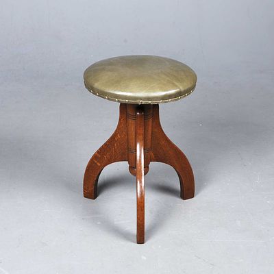 EDWARDIAN OAK PIANO STOOL height adjustable green leather seat, 38cm D x 54cm, lowest height.