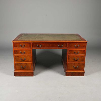 GEORGIAN STYLE YEWWOOD PEDESTAL DESK green leather top above nine drawers, 77cm H x 151cm W x 
