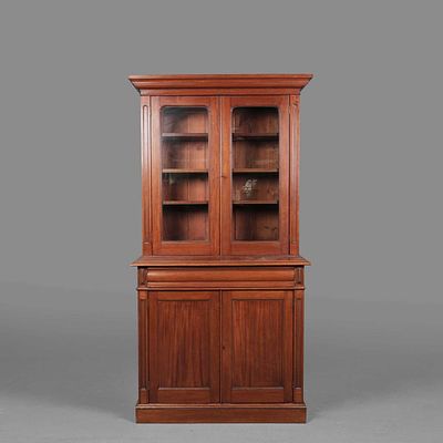 VICTORIAN MAHOGANY BOOKCASE two glazed doors enclosing adjustable shelves above a drawer and 