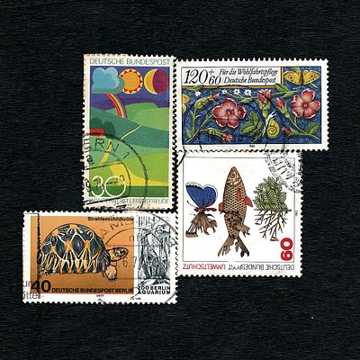 A Group of Four Used Postage Stamps from West Germany, 1974-1985. A group of four used West 