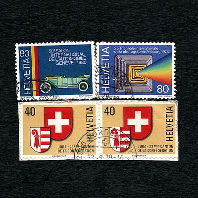 A Group of Four Modern Swiss Commemorative Postage Stamps, Including "Jura - 23rd Canton". A 
