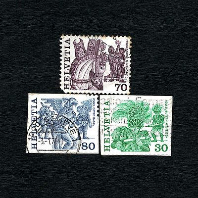 Three Swiss Stamps from 1977, Folklore Series. A set of three Swiss postage stamps from the 1977 