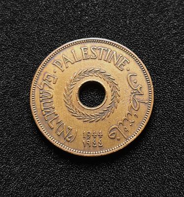 פלשתינה ארץ ישראל מטבע מתקופת המנדט בעריך 20 מיל ברונזה משנת 1944 המבוקשת במצב כמעט חדש