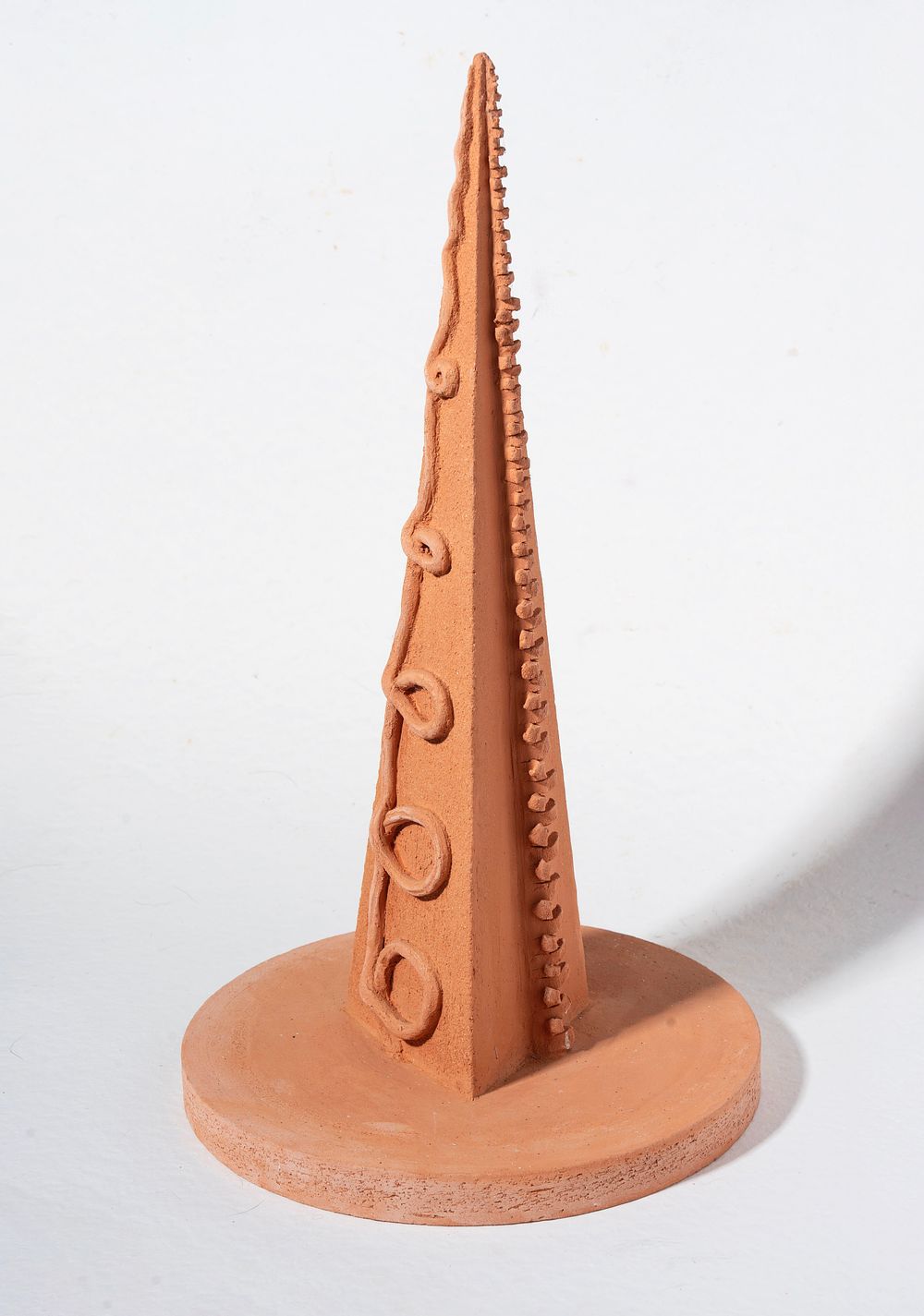 Thea Tini (1955 - ), 
“Axis of New World”, 2011, Ceramic. 
cm 30 &times; 50 &times; 30. This work is in 