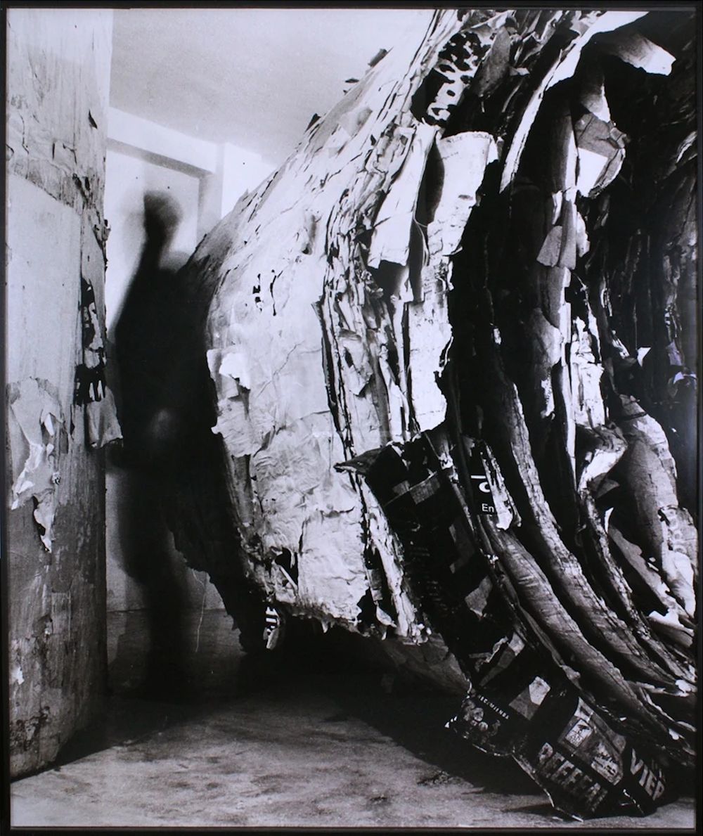 Santiago Sierra (1966-)
“Documentation of Two 250 x 250 cm Cylinders Made of Torn Posters” 