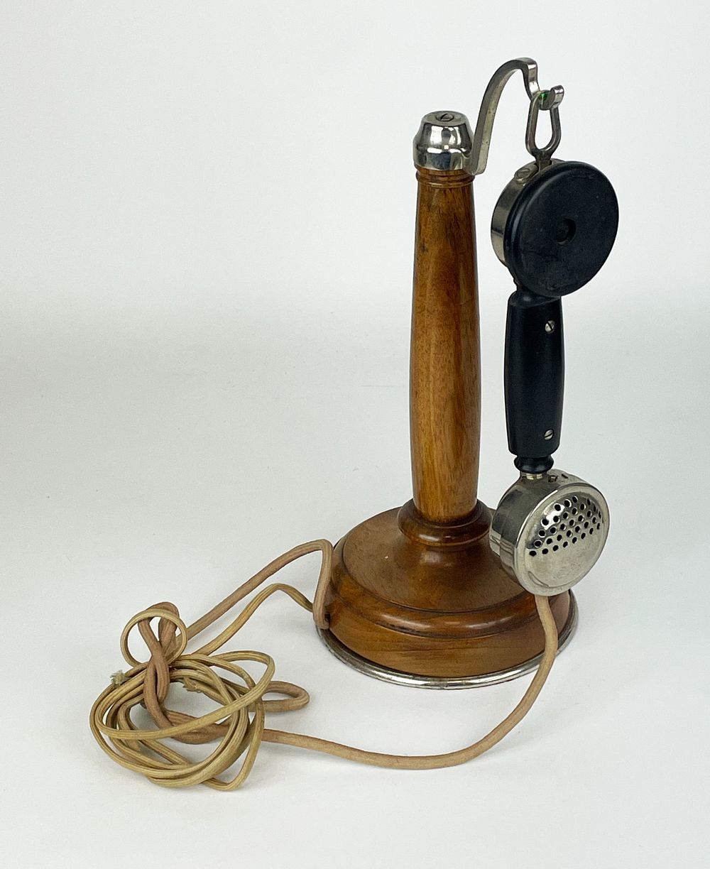 Telephone, wooden stand, ﬁrst half of the 20th century, 
15 x 36 cm
. Good conditions, non 