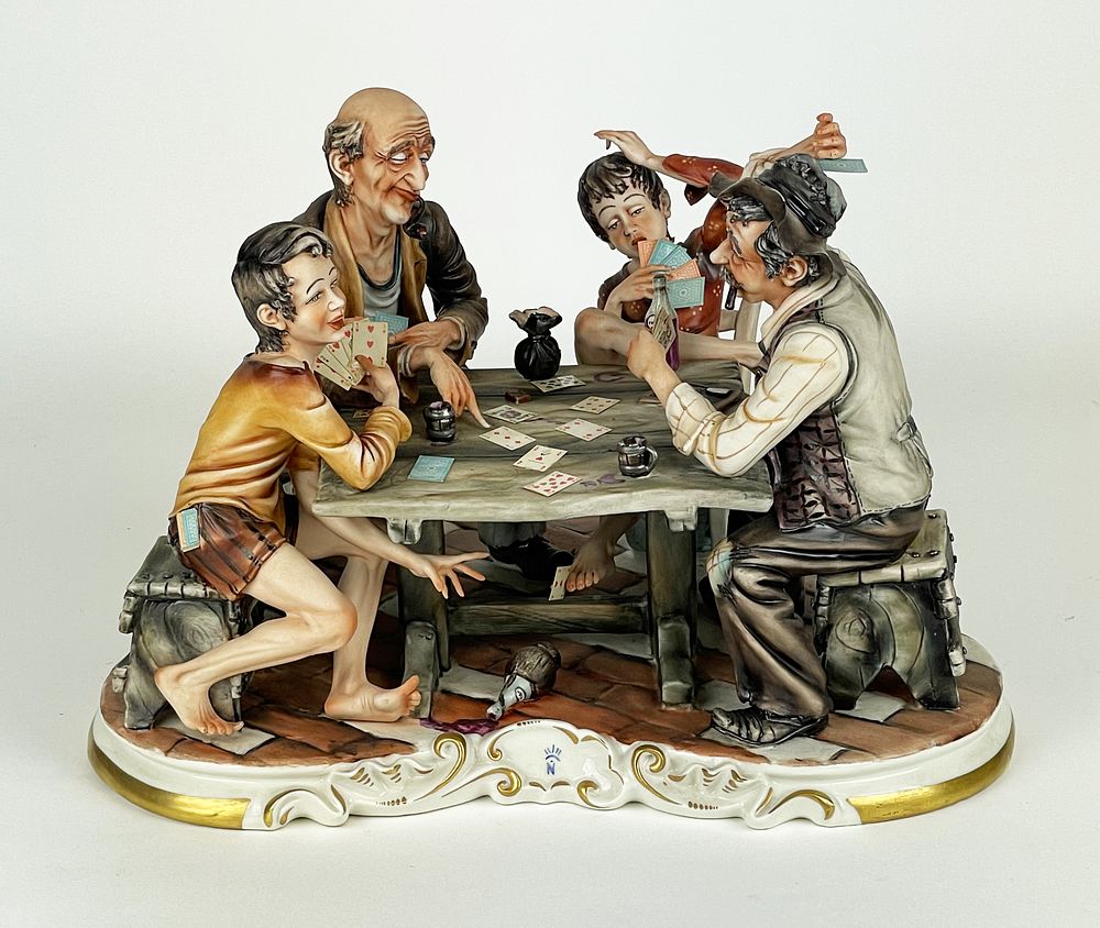 Polychrome artistic porcelain marked Capodimonte, representing card players, second half of the 