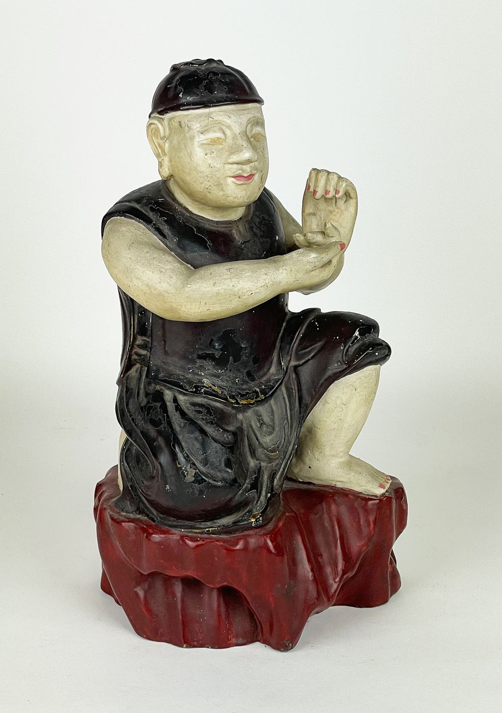 Antique wooden sculpture, China, ﬁrst half of the 20th century (ca. 1910-1930), depicting a 