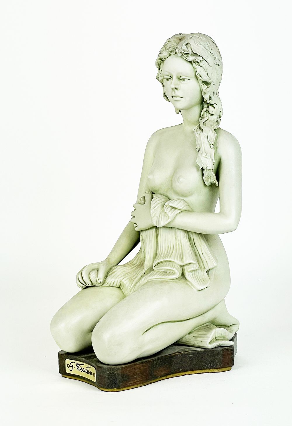 Biscuit artistic porcelain marked Visentin (1938 - 2010), representing a nude woman with a 
