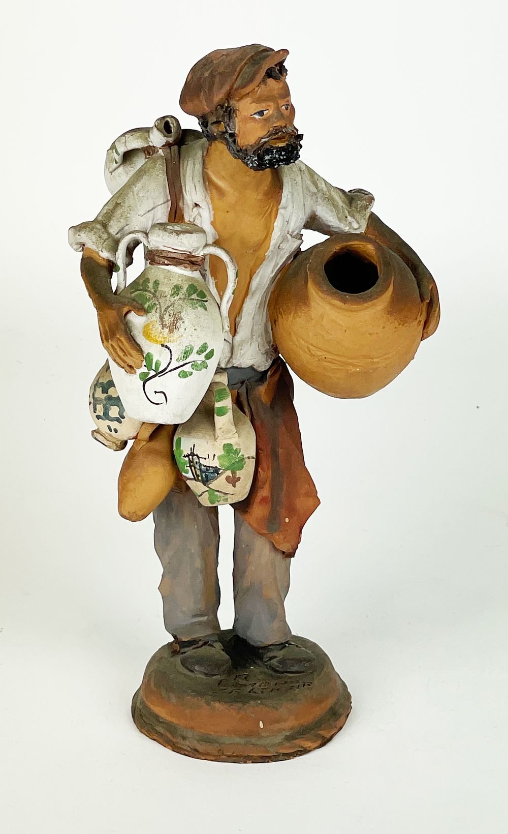 Artistic terracotta sculpture representing a potter, second half of the 20th century, 
14 x 24 