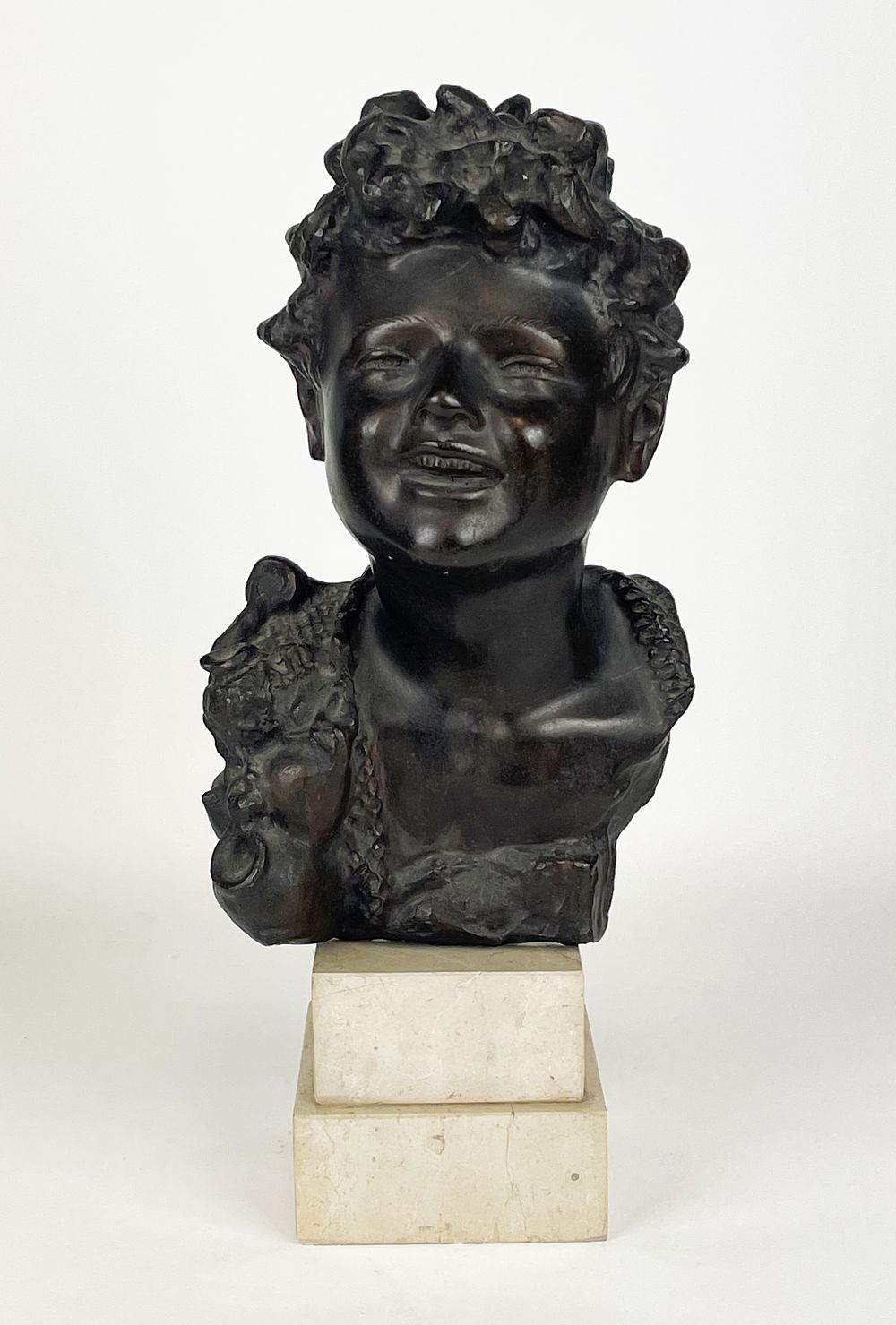 Bronze sculpture by De Martino (1870-1935), "Child's Face”, ﬁrst half of the 20th century, 
38 