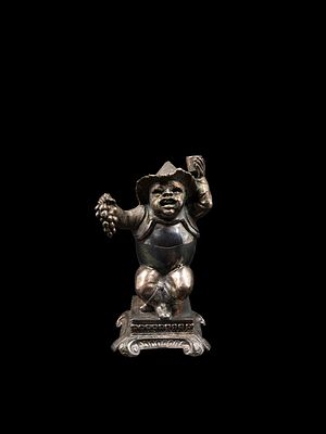 SILVER FARMER FIGURINE, Germany, 19th century. h cm 10,5.Cast, shaped and engraved, depicting a 