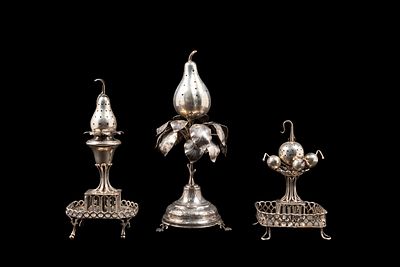THREE SILVER TOOTHPICK HOLDERS, Portugal, early 20th century. The larger h cm 22.Spun and finely 