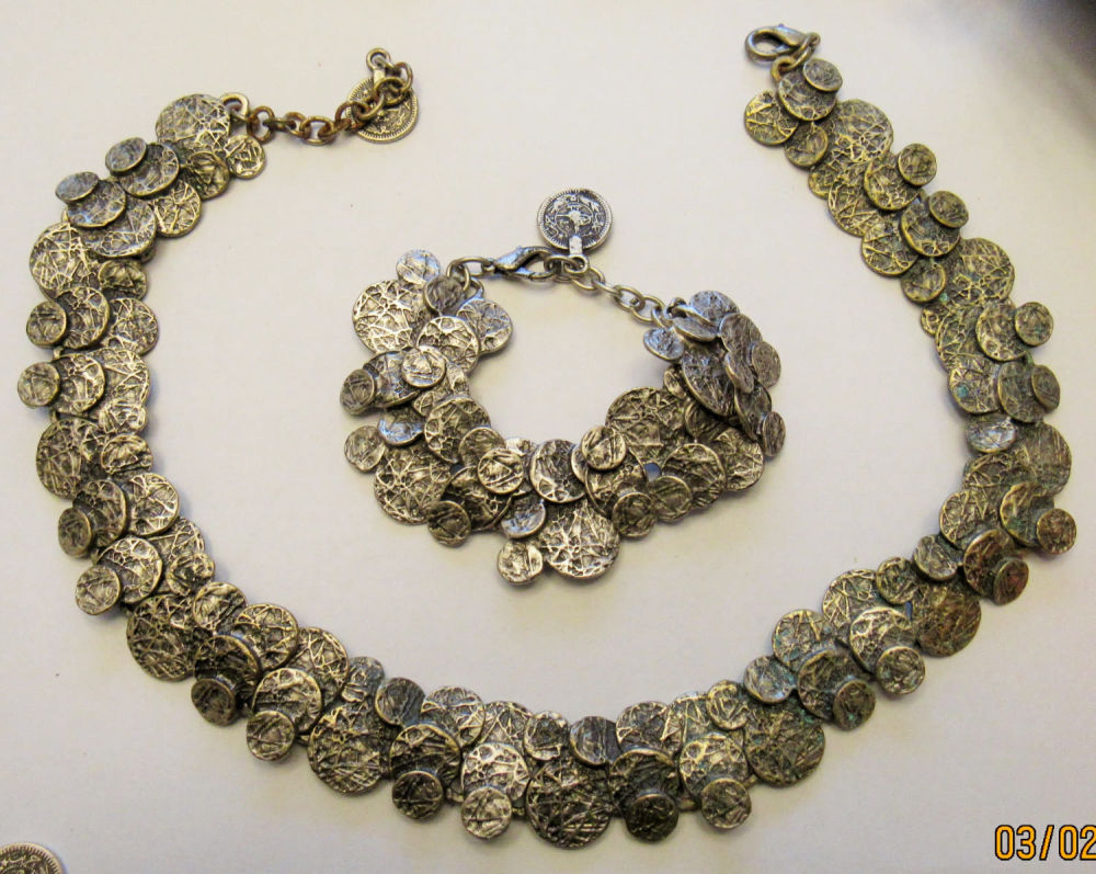 Lot 193: MCM BRUTALIST SILVERTONE NECKLACE AND BRACELET. UNMARKED BUT CHECK OUT THE QUALITY CONSTRUCTION. NECKLACE IS 19" OVERALL. BRACELET 8" OVERALL.