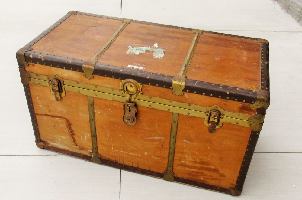 Lot 145: VINTAGE STEAMER TRUNK WITH CANADIAN PACIFIC LABELS. GREAT PATINA.