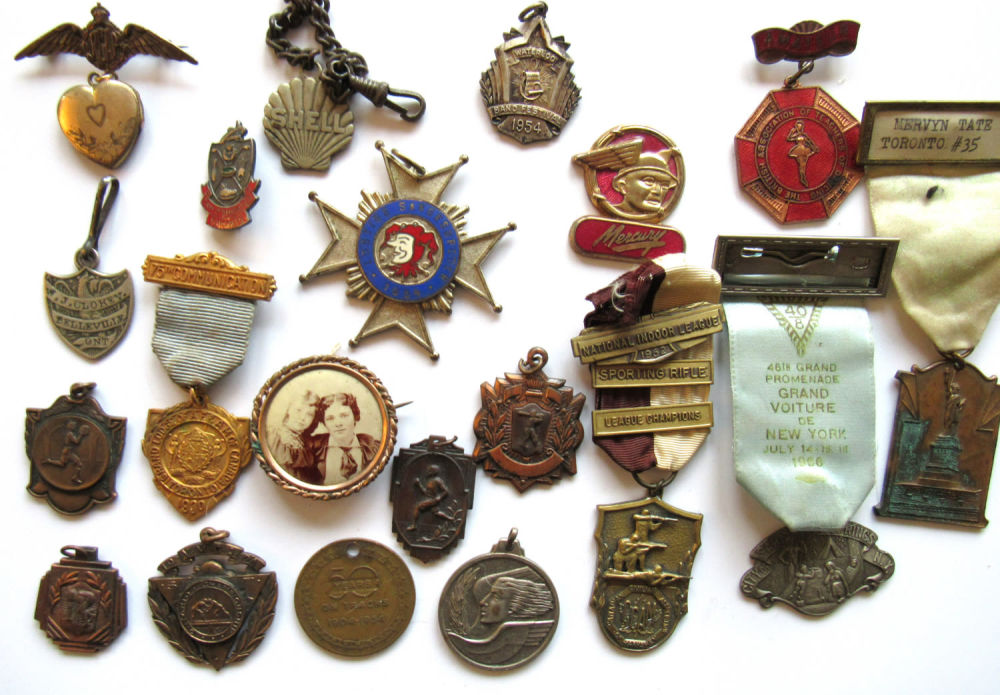 Lot 180: DEALER BONUS LOT ASSORTED MEDALLIONS. ALL FOR ONE BID. SPORTS, RCAF SWEETHEART PIN, SHELL EMPLOYEE FOB AND MORE.