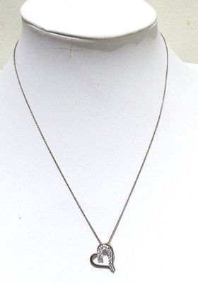 STERLING SILVER NECKLACE WITH STERLING HEART PENDANT CONTAINING ICE CRYSTALS.
