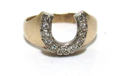 10KT YELLOW GOLD WITH 14KT WHITE GOLD MOUNT DIAMOND HORSESHOE RING. SIZE 5.25.