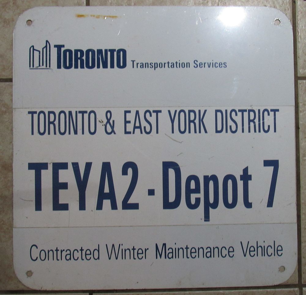 Lot 92: VINTAGE CITY OF TORONTO TRANSPORTATION SERVICES METAL SIGN.