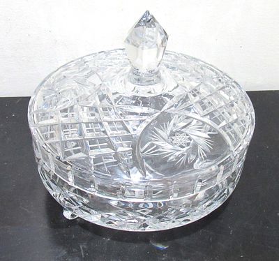 BIN PRICE $10. PINWHEEL CRYSTAL FOOTED COVERED CANDY DISH.