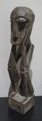 BIN PRICE $10. VINTAGE WOOD CARVED AFRICAN SEATED MALE.