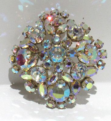 SIGNED SHERMAN BROOCH.