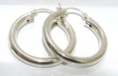 CLASSIC STERLING SILVER LARGE HOOP EARRINGS.